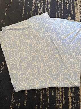 Caden Lane Light Blue and White Bow Print Baby Swaddle